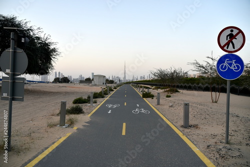 Dubai skyline from Nad Al Sheba bicycle track road, Dubai, United Arab Emirates