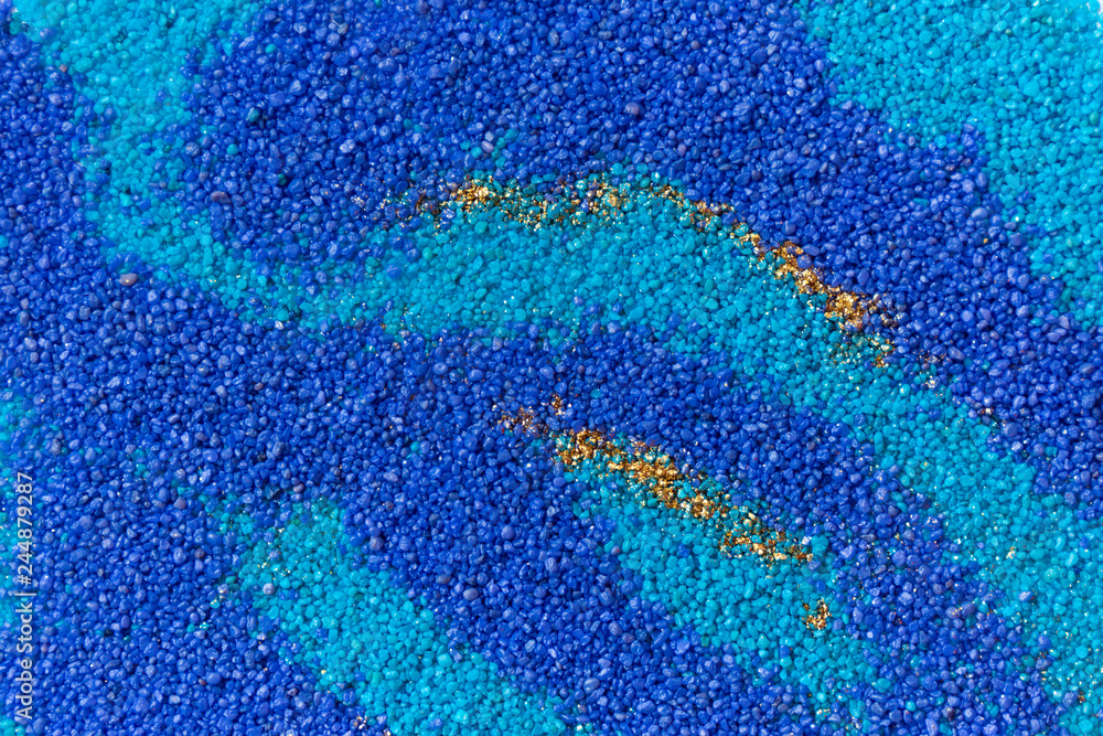 Layered colorful sand pattern. Marble style background. Blue and gold powder texture. Layered colorful sand pattern. Marble style background. Blue and gold powder texture.