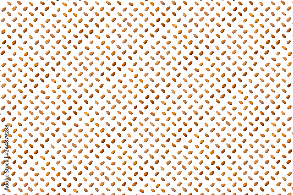 A collection of almond lie in straight rows along dioganals on an isolated white background. with clipping path. Almond pattern A collection of almond lie in straight rows along dioganals on an isolated white background. with clipping path. Almond pattern