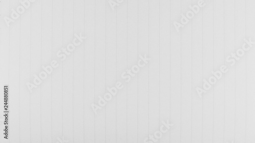 white lined sheet of notepad. - paper background.