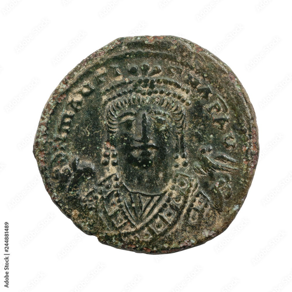 Ancient copper or bronze byzantine coin isolated on white