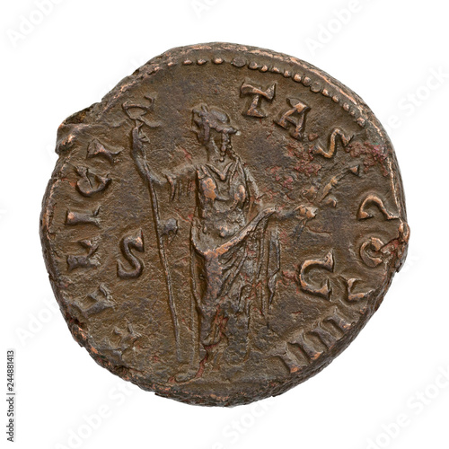 Ancient copper or bronze roman coin isolated on white