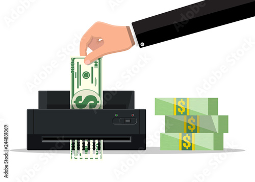 Hand putting dollar banknote in shredder machine