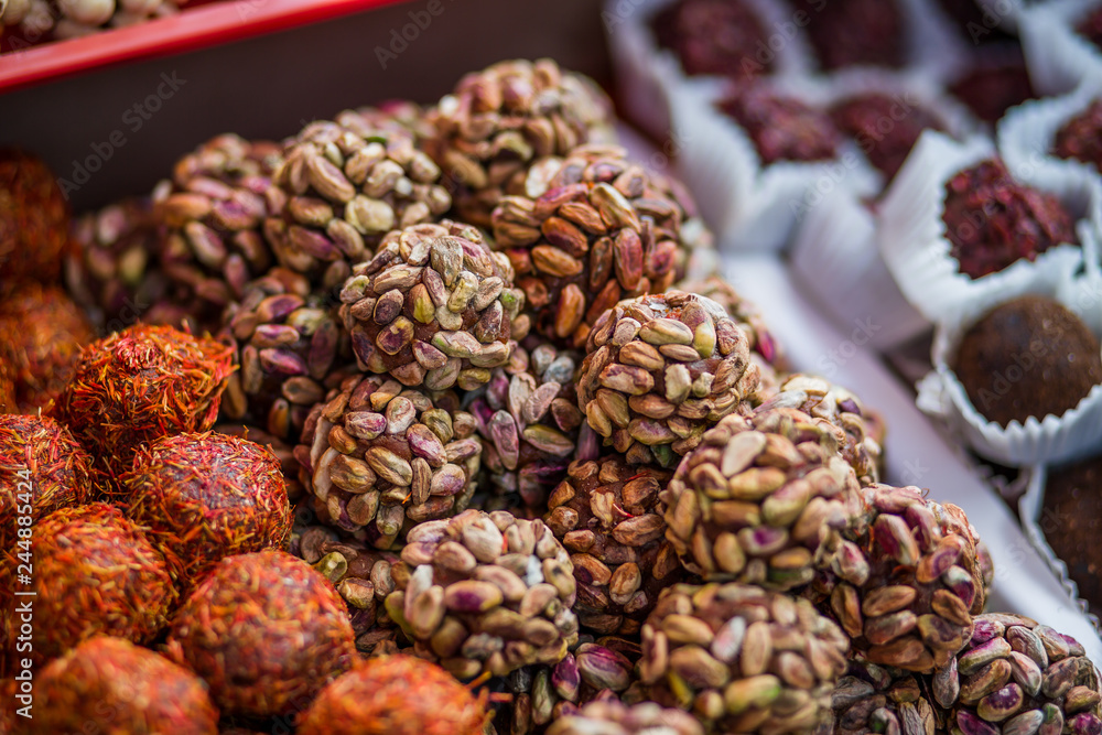 healthy handmade sweets made from fruit juice, nuts and seeds close-up. healthy snack for children and adults. concept of proper nutrition healthy handmade sweets made from fruit juice, nuts and seeds close-up. healthy snack for children and adults. concept of proper nutrition