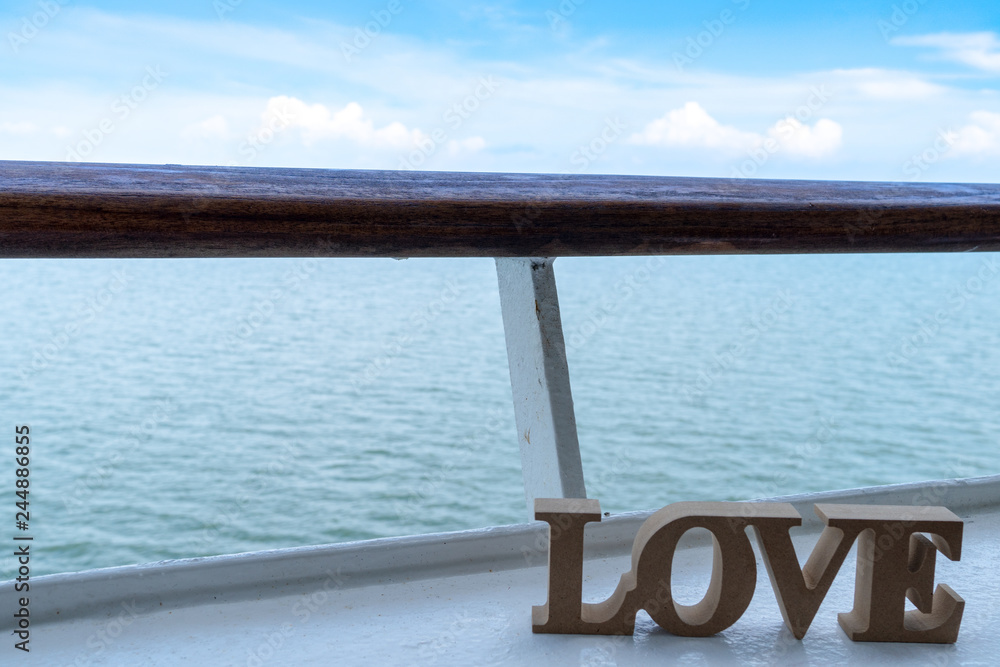 3d Wooden letters of LOVE with the sky and the ocean 3d Wooden letters of LOVE with the sky and the ocean