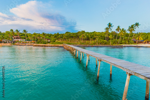 Wood bridge idyllic sea beach turquoise water