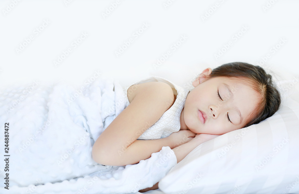 Sleeping beautiful Asian child girl lying on bed. Sleeping beautiful Asian child girl lying on bed.