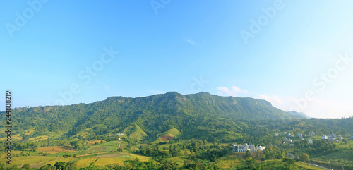 Landscape view of blue sky mountain and village in Thailand. © zilvergolf