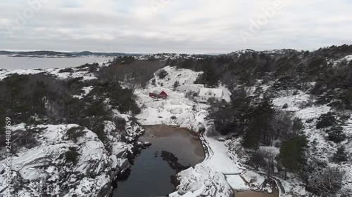 Aerial of Hellevika during winter. Norway 4K Drone photo