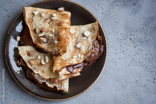 Crepes with chocolate and hazelnuts