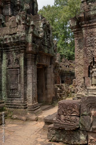 Stone portico opposite another building in temple