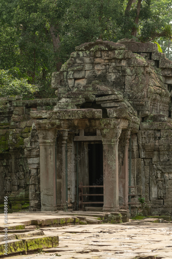 Ruined temple entrance with columns in jungle Ruined temple entrance with columns in jungle