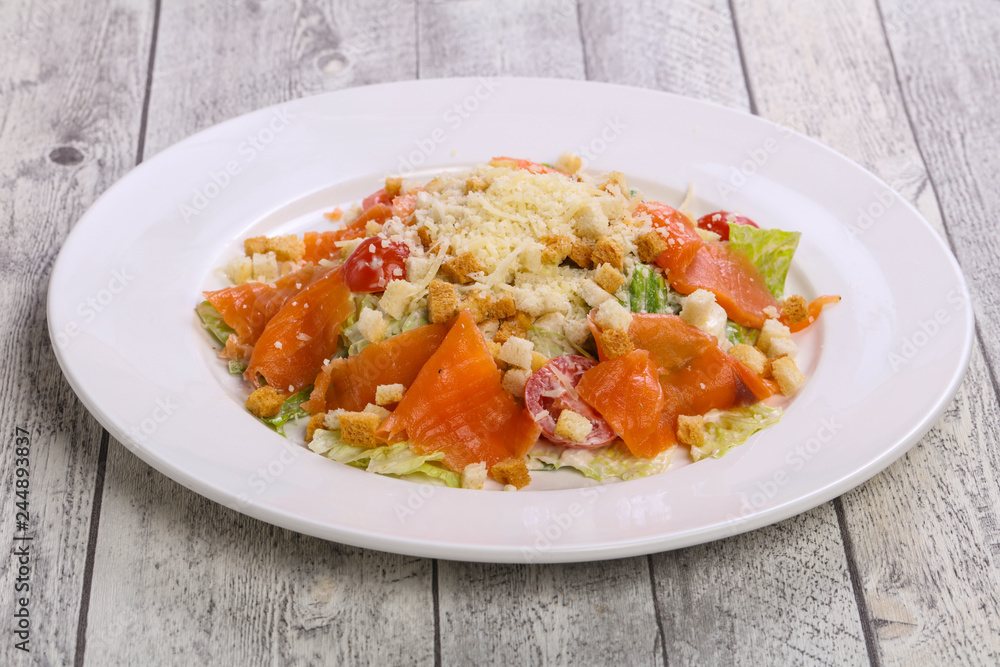 Caesar salad with salmon and parmesan Caesar salad with salmon and parmesan