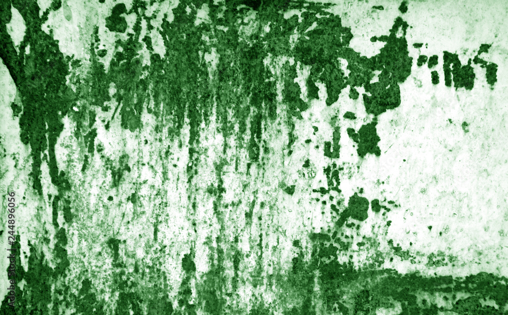 Grungy rusted metal surface in green tone.