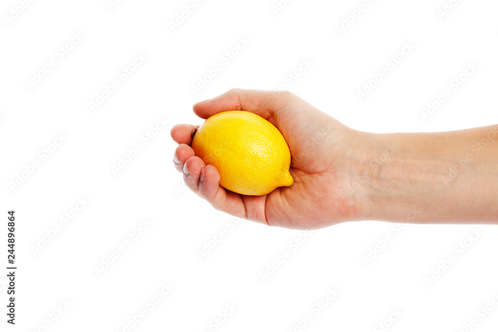 Lemon in hand isolated on white background Lemon in hand isolated on white background