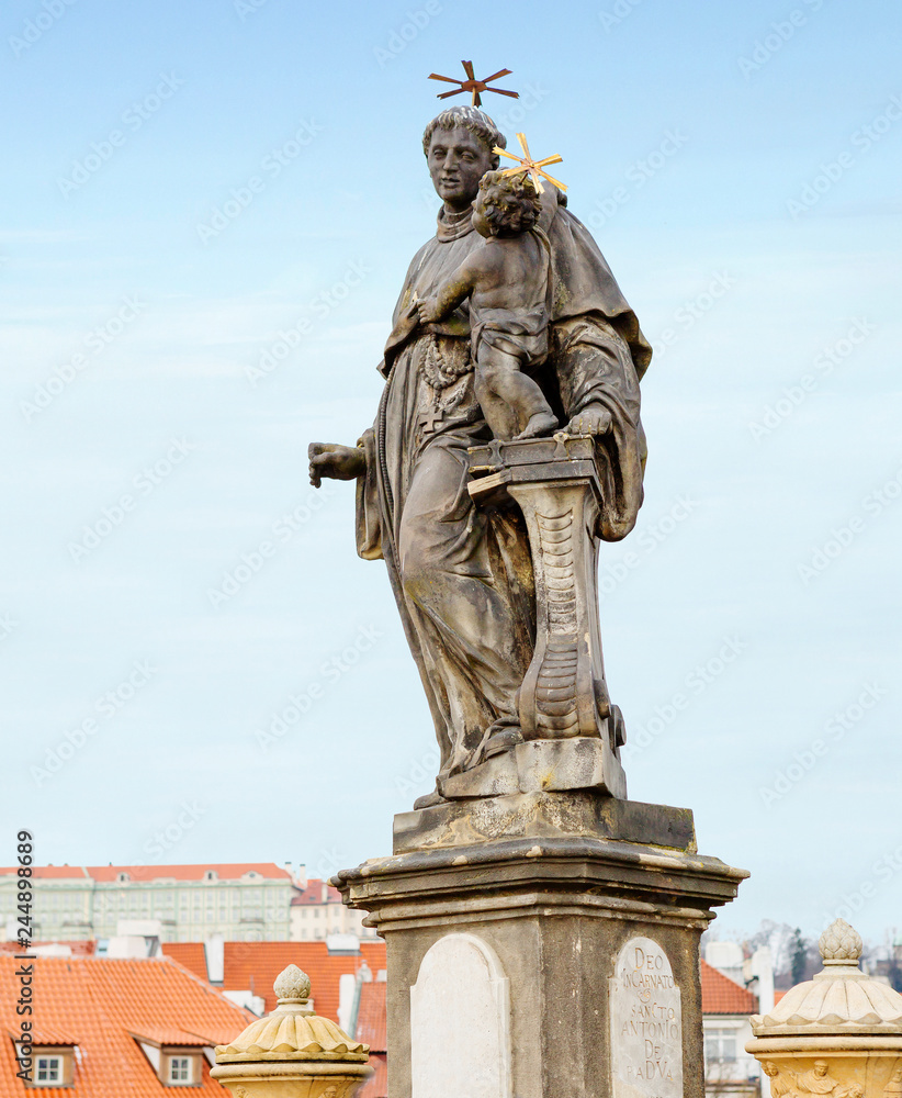 Prague, Czech Republic, Charles bridge. Sculpture Of St. Antony. The work of 1707 depicts the preacher of the Franciscan order. Saint Anthony is the patron Saint of the wandering and the poor.