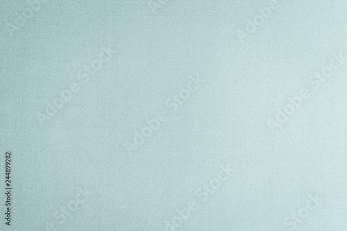 Silk fabric wallpaper texture pattern background in light pale blue green teal color tone