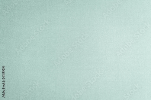 Cotton silk blended fabric wallpaper texture pattern background in light pale pastel green color