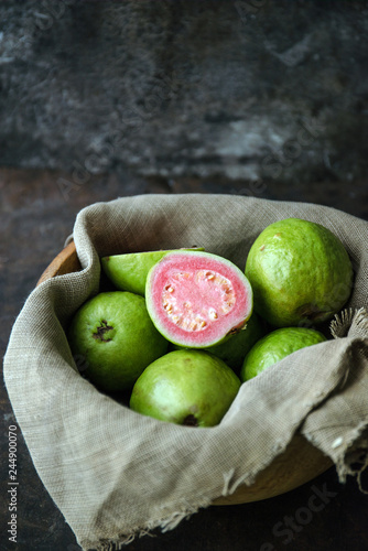 Fresh ripe guava on rustic background