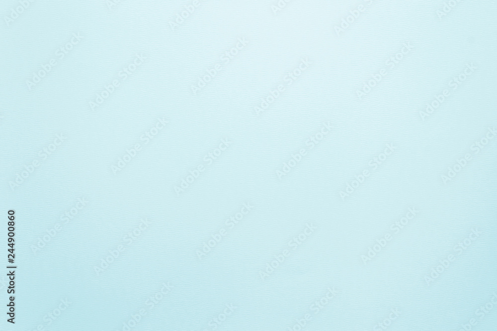 Fototapeta premium Water color paper texture background in light blue