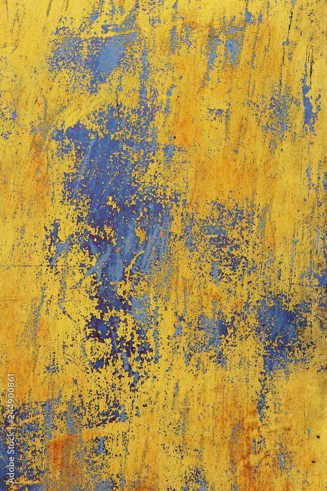 view of the part of the surface of the iron with the old cracked yellow paint
