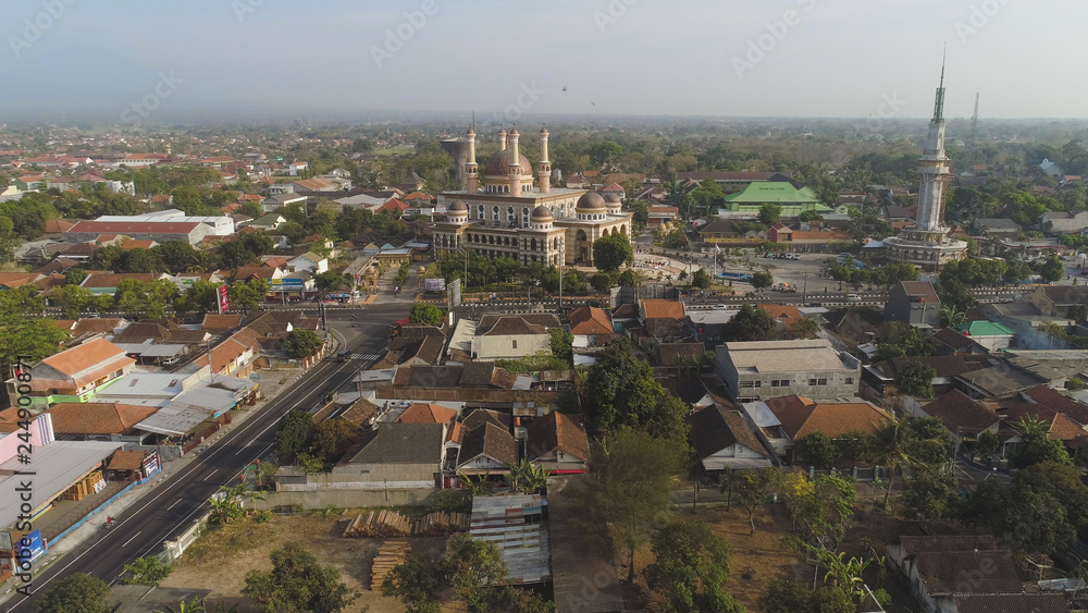 Fototapeta premium beautiful mosque with minarets on island Java Indonesia. aerial view mosque in an asian city