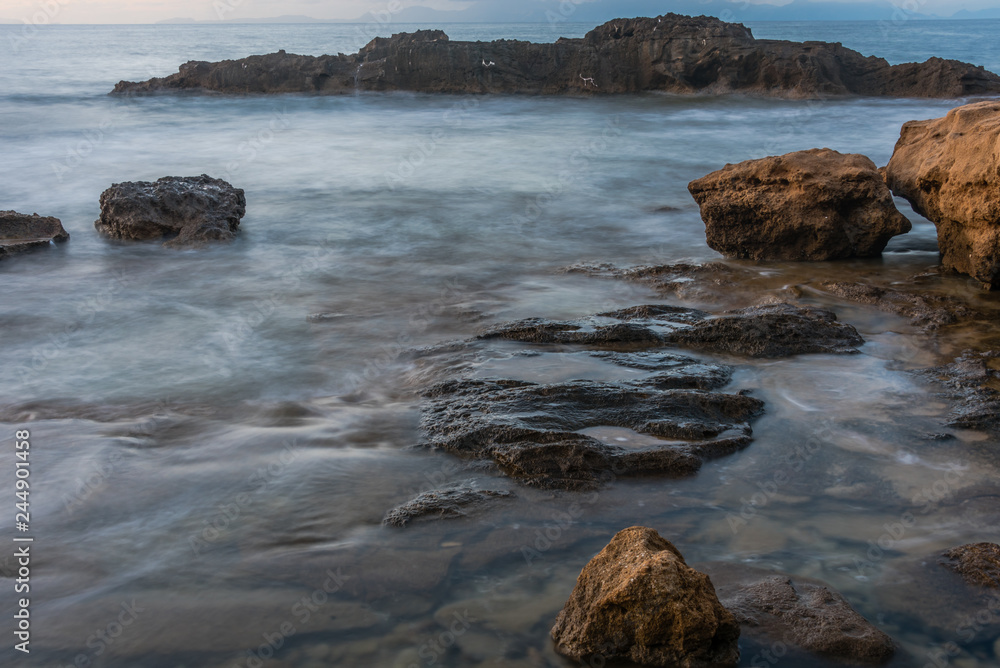 Long Exposure of the Mediterranean Sea along the Southern Italian Mediterranean Coast at Sunset