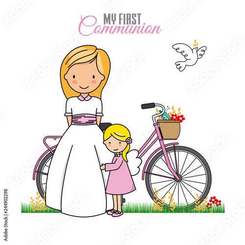 my first communion girl. Little girl in angelido next to a bike