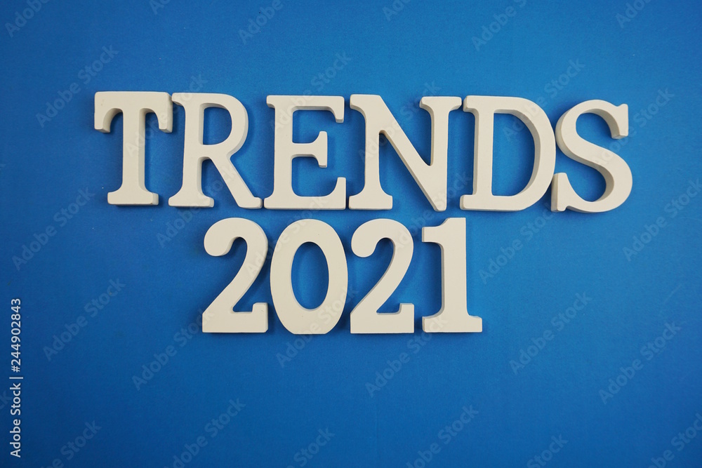 Trends 2021 word alphabet letters on blue background
