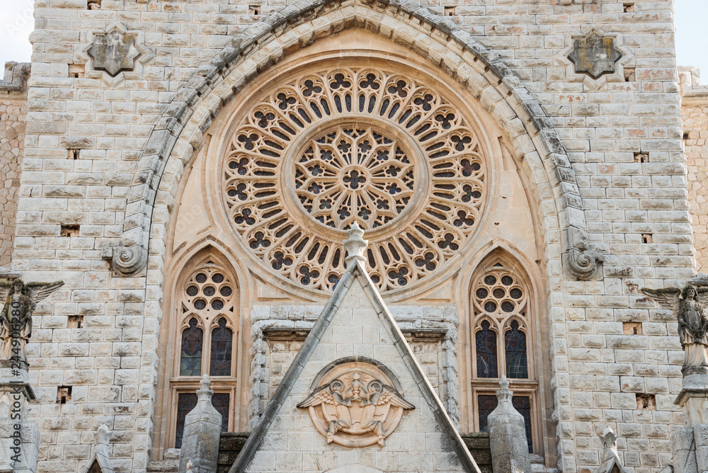 Detail of beautiful gothic cathedral Saint Bartholomew in the central square of Soller, Mallorca island, Spain