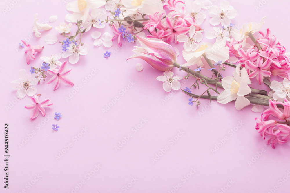 beautiful spring flowers on paper background