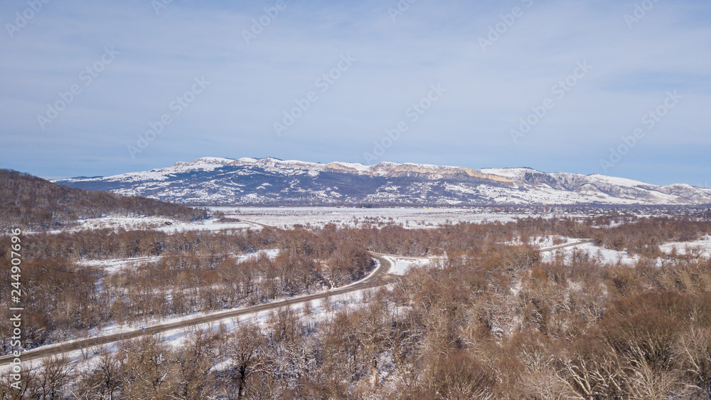 Beautiful Morning Winter Mountain Sunny Landscape. Location place Psebai, Russia.