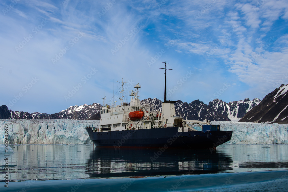 Fototapeta premium Expedition vessel in Arctic sea