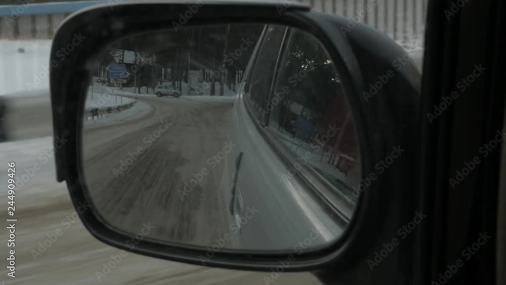 Car view of the side rearview mirror, reflection Mountain landscape. slow motion Car view of the side rearview mirror, reflection Mountain landscape. slow motion