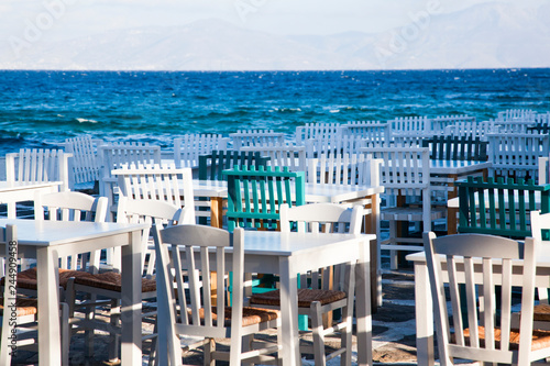 restaurant chairs and tables by the sea