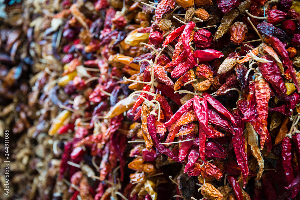 Hundreds of dry red hot chili peppers on the market