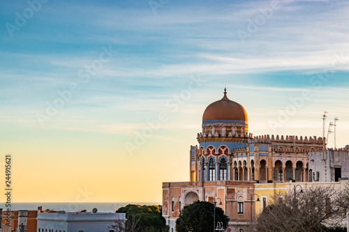 Fotografie a view of Santa Cesarea Terme at sunset, with its splendid Arab and Moorish palaces, Puglia, Salento, Italy