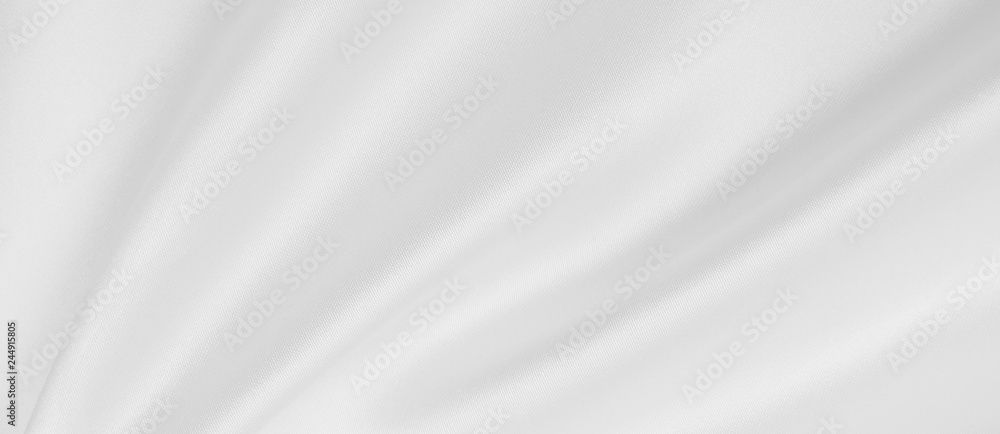 Fototapeta premium Smooth elegant white silk or satin luxury cloth texture as wedding background. Luxurious background design