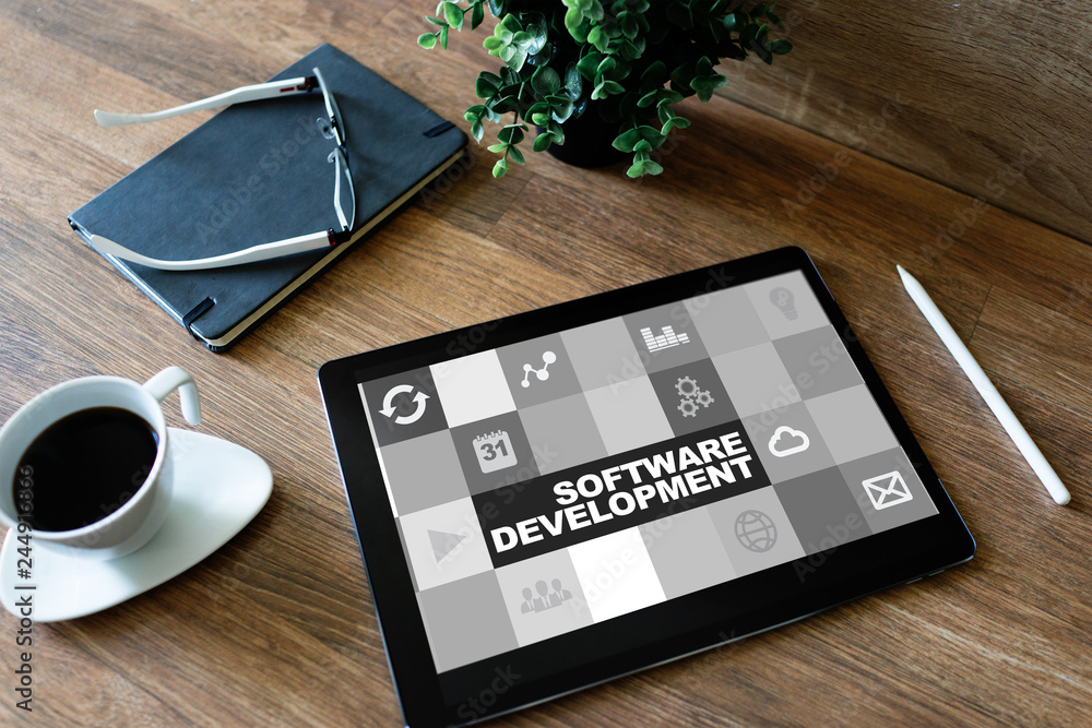 Software development and process automation concept on tablet computer screen. Software development and process automation concept on tablet computer screen.