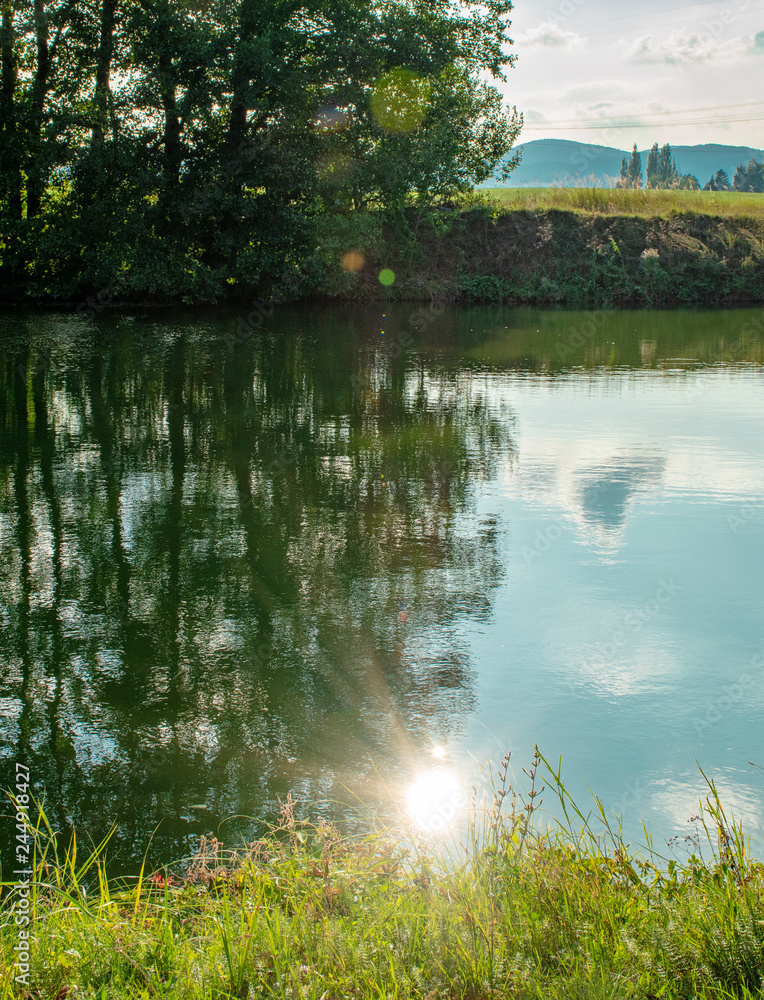 Fototapeta premium sun reflection on the lake in the summer
