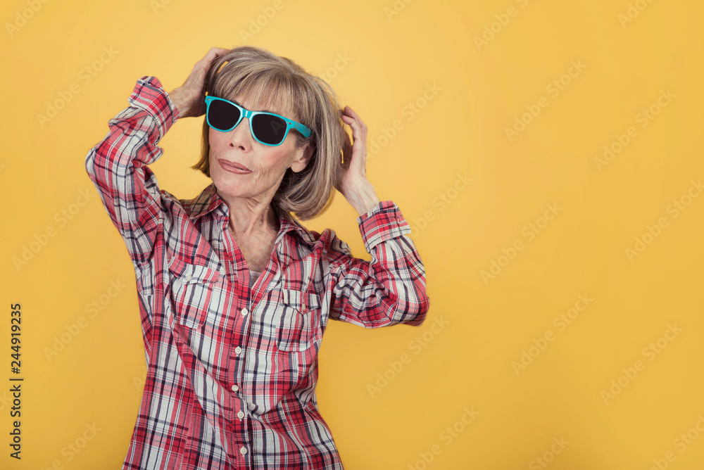 smiling senior woman with Sunglasses