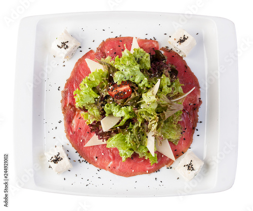 Foto Mix salads on meat carpaccio with Philadelphia cheese