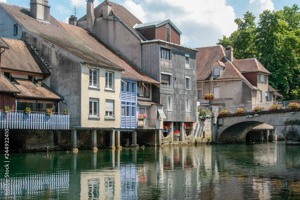 Ornans France 09-15-2018. Houses on river la Loue in Ornans France