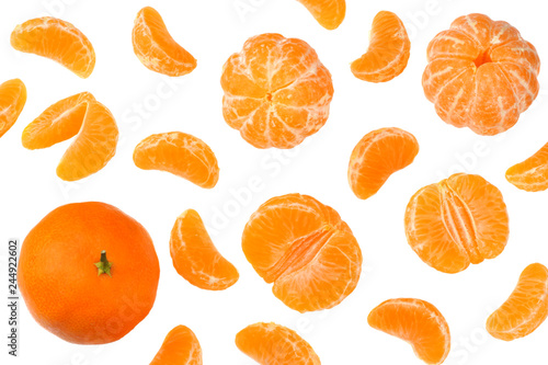 mandarin with flying slices isolated on white background
