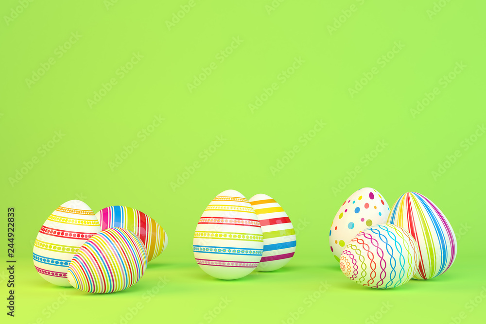 Fototapeta premium Frohe Ostern - 8 farbenfrohe, bemalte Ostereier auf grünen Hintergrund - Textfreiraum - Oster