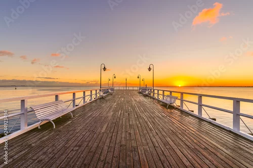 Obraz wschód słońca nad morzem