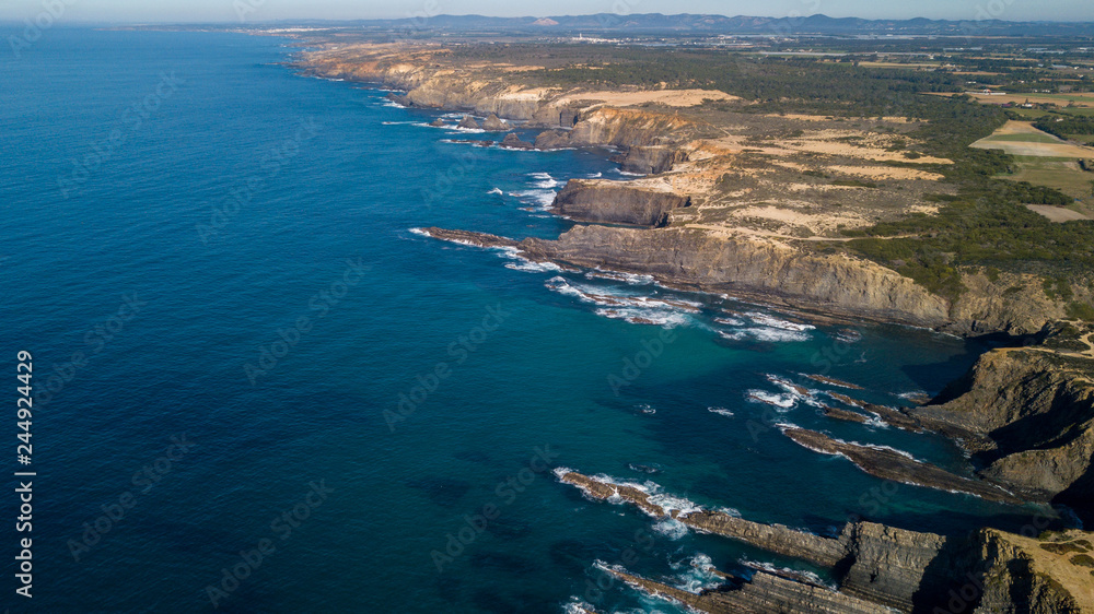Aerial view of the Cabo Sardao cliffs and Waves Atlantic coast Portugal