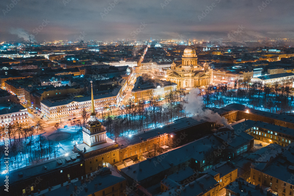 Obraz premium Night panoramic view from the aerial view of the center of St. Petersburg. St. Isaac's Cathedral, the spire of the Admiralty.
