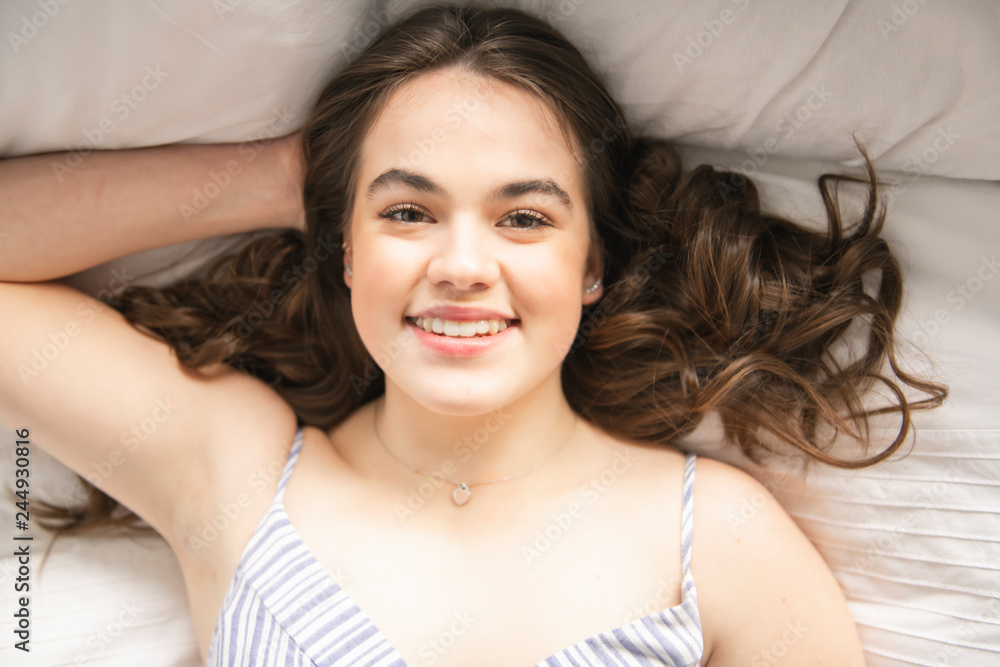 pajamas women on Bed relaxing on the morning pajamas women on Bed relaxing on the morning
