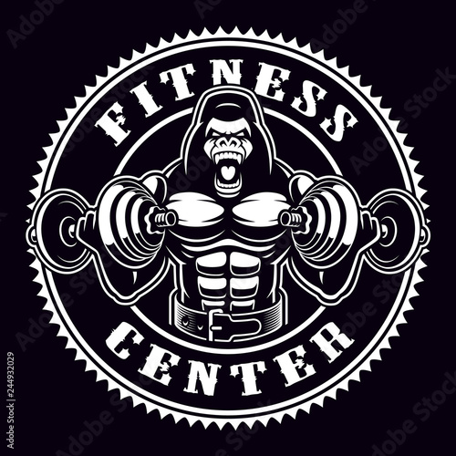 Vintage round badge of a gorilla bodybuilder with dumbbells.